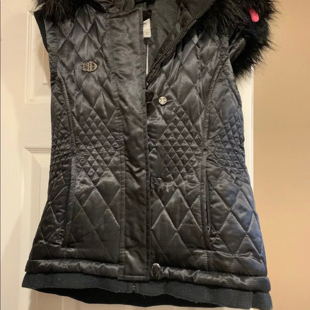 Women’s Harley Davidson hooded vest.